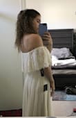 I was a bit nervous because it's a strapless dress and typically strapless dresses fall down on me. I ordered a size small despite the fact that I'm normally a medium in clothing. I wanted to have a more snug fitting dress so that maybe it wouldn't slip if it hugged me a bit tighter. I'm glad I got a smaller size than usual because it actually fits how a dress should, and not like the snug fit I was going for. I'm fine with the size though because it actually holds up really well in the arm region.
Also, it has arm holes and it's not like some wimpy piece of fabric that hangs over your arm. It's actually thicker, with multiple layers of fabric. It's really beautiful! The entire dress feels heavy and really great quality. It's a super long dress though. I tried it on with platform heels and it was still dragging on the ground. Overall, I absolutely love it! I'm really glad I went with this one. - Bianca L.