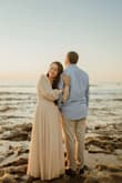 I had to get the dress altered to remove some of the length but other than that the dress fit perfectly. The sleeves were also a tad bit long but nothing too noticeable. - Elizabeth M.