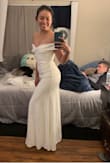 I wore this on my Courthouse wedding day and I got so many compliments about it. It's just so perfect if you're rooting for a simple elegant look. It compliments the body very nicely. It runs small but it's no biggie they immediately send me the larger size in just few days! I love it so much ! - Nina F.