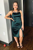 Bought this dress for a military ball, it's nice and thick, after having it hemmed and the slit raised it was perfect! The neckline is a little loose and can bag out, but it didn't really bother me. - Jade G.