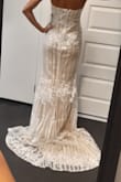 This dress is gorgeous! Fits nicely (would like it a bit tighter but it's great nonetheless). The material is thick and intricate (not cheap looking at all). Can't wait to wear it for my bridal shower! - Maria S.