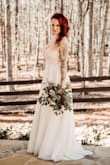 I had to get the top let out some but other than that it fit perfect and was beautiful for our wedding. I didn't take the extra skirt off, I loved the look of them together. - Jenn H.