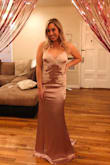 This dress was so comfortable and so flattering. The train was very elegant but not too heavy. Unlike most "silky" dresses this one had some stretch and didn't pull in an unflattering way. I felt amazing. - Christie L.