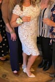 I ordered 6 similar dresses from Lulus for my bridal shower, and this one was the winner. So comfy and classy.. I got so many compliments on it! - Marcie R.