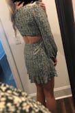I absolutely loved the pattern and material of the dress! It's quality made and a really cute design. I was really torn on whether or not to keep the dress or return it because the torso length is a little short which causes the cut out in the back to hit you higher than it's intended to. 

I went on a trip and missed the return window, otherwise I would have also ordered a large to see if the torso was longer (and just have a seamstress take in the sides) and returned whichever worked the least.

Super cute and highly recommend if you have a shorter torso! - Kayla S.
