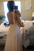 Love this dress!! Wearing it in my best friends wedding! Fits wonderful and is very flattering. I heard it ran big. I run a small or medium usually because of my hips and I got a small and it fits great!! - Cami D.