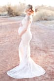 I would normally order a small but wanted a whimsical type of dress for my maternity photos. I found this dress and fell in love. I was worried it would look too bridal but I bought it anyway.  The location of our photos and the dress were a perfect match! I bought a medium to wear at 34 weeks. I would usually wear a small so I would say this is pretty true to size as I've stayed true to size as I've gone through my pregnancy other than my belly. Highly recommend this dress to anyone looking. Also, I even spoke with one of the customer service reps to discuss size and he was SUPER helpful. Lulus is my go to and this experience was the best yet. - Jennifer F.