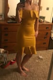 I can't believe how thick and forgiving the material is on the dress. It holds you in and is so super comfortable. I haven't worn it to the wedding yet- but I am anxious to! The color is bright and beautiful( hard to tell in the photo -poor lighting. =,) - Carrie J.