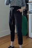 Love these pants, the waist is definitely the right size but the thigh and butt area do loosen up with wears. I almost wish I had a M waist size with a S pant leg. Considering getting these tailored for a closer fit, but for now a quick wash helps tighten them up a bit. Photos included shown after about 3 wears. Great pants for wearing all day, I never feel uncomfortable in the way that some high waisted pants make me. Very cute! A little overpriced for the actual quality and being 100% polyester, but if purchased at a discount they are worth it. - Sarah B.