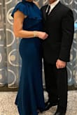 I LOVED wearing this dress!!  Just enough details to make it memorable.  The material is very thick, in a good way.  I only needed to take it up a hair in the bust line.  It hugs so nicely. - Margaret T.