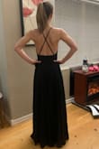 With the adjustable straps the dress fits perfectly! It's comfortable and light but has just enough weight that it drapes beautifully! - Breshelle P.