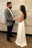 Wore this to my casual city hall wedding and loved it!!! Didn't need to have it altered at all. It was a tiny bit long but heels made it perfect. Some of the beading on the straps came loose but that is to be expected. I love this dress! - Elyse S.