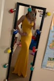 I absolutely love this dress! The colour is super vibrant and exactly like the picture, the lining is amazing and it fits really well. I'm from Australia and it arrived within 2 weeks which was amazing! I ordered it for my school formal and I am so happy with it!

I knew from all the reviews that it was going to be too long, however with some big heels it barely skimmed the ground (In the photos I am wearing 4 inch heels- they were taken before I got the dress hemmed) If you are short like me, I would definitely recommend getting this dress only if you have someone available to hem it and bring the straps in. 

Also, this dress pretty much shows every lump and bump. It looks gorgeous but I would strongly recommend wearing shapewear underneath it to ensure you don't see any underwear lines. (First picture= no shapewear, second picture=shapewear and a better bra) - Linda S.