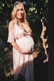 I am normally 5'7" and 145lbs, but I bought this dress in a large for my baby shower and it was great! The fabric is very heavy and flowy so it felt very well made and looked really elegant. I am 36 weeks pregnant and really only gained a belly so I think normally I'd get a small because the chest area was pretty big, even though I'm practically a d cup now. It's also long, I'm wearing 3" heels in these pics, but I liked that. The great thing is that it's pretty adjustable so I think it would still have worked even if I was bigger. Normally I'd order a medium in Lulus dresses but I'd say if you have similar measurements to 5'7" tall, 130-150lbs, and 34C, go with the small. And pro tip: use those little silicon/stick on nipple covers to go braless and smooth. - Gianna S.