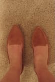 After buying several different brands with styles like this I was losing hope in them looking good and not making my little feet look huge! 
No break in required, made in Brazil, leather moves with your foot, very comfy and looks fantastic with boot leg and skinnies! Pricey but cannot beat comfort - Becca S.