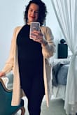 This cable knit is absolutely gorgeous! Flattering with anything you piece it with. It's the perfect 'warmth' for a cold day. I paired it with a black bodysuit, leggings and boots. The compliments were flowing. I may order another one, as I foresee myself wearing this one out ;) - SARAH H.