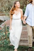 I got this dress to take my engagement photos in and it was a show stopper! My fiance and photographer both loved it as much as i did. Usually my problem with clothing is the fact that I have a large bust but small back so the fact that this dress ties in the back was perfect! It's definitely pretty long but the xs still worked for how short I am. Pretty fabric but definitely needs to be steamed and I had to cut off some loose strings. I will be wearing this for my bridal shower too! - Taylor C.