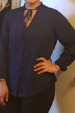 I love this shirt , nice color  a bit loose, but i could work with that,casual you can wear with jeans ,skirts or tights. - Kenia P.