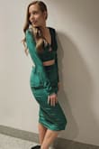 I got so many compliments on this two piece. The only thing is the skirt is an elastic band and didn't fit my waist how I wanted. Other than that, I LOVED IT! - Ariana J.