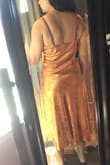 I wanted to love this slip dress but it just didn't make the cut. The fabric and color are beautiful but the fit is weird. It's a bit loose on top and tight in the middle, and it bunches up in the back. It also looks like a nightgown. Not for me. - Melina C.