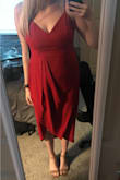 Beautiful dress, but I had originally ordered a medium and had to return it to get a large. Medium was super tight in the bust, although it felt comfortable everywhere else. The large is a little big in some areas, but definitely fits better than the medium. - Drew H.