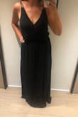 Long enough for someone tall!!!
The struggle of finding a long dress when you're nearby 6ft tall is unbearable. Till now. 
Love this dress! Was perfect for a cool night out in Miami. Tons of compliments! - Lia Z.