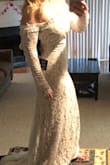 Dress itself was beautiful but it was extremely long and tight in the back and arm area. I couldn't zip it up in back because it was too tight. Definitely would order a size small next time instead of XS. - Christine B.