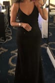 Adjustable straps, great fabric, just what I needed for a gala and under $100 - Jeanette C.