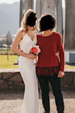 It was perfect for our secret 'courthouse' wedding! We're having a big wedding later in the summer so I wanted a beautiful dress for this ceremony that didn't cost an arm and a leg. With heels, the dress fit perfectly and required no alterations whatsoever. The hardest part was finding shapewear to go underneath since every seam and line was visible. I bought probably 8 different pairs and none of them worked (ended up just going with pantyhose). Overall, I would highly recommend this dress! - Lauren S.
