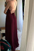 I ordered this dress for prom. I returned it because it was too casual, but still a VERY pretty dress. I have a small bust, so I was worried the chest would be too loose, but the "corset" in the back allows you to tighten it as much as you need. Slit is more open than shown on model so just be careful in the wind. beautiful color. Lulus has some rly gorgeous dresses! - Tess R.