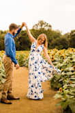 Perfect dress all around! Photographed amazing in my engagement photos. Possibly runs a little long but I'm 5'4 and wore wedges and it was perfect! - Macy P.
