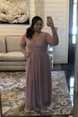 I ordered this dress as a Matron of Honor for my best friend's wedding (she was an easy bride who let us order whatever dresses we wanted). The dress was gorgeous! True to size (I'm just short so I had to hem it at the bottom but that's nothing really for me). It was perfect around the bust. The sleeves are not tight which is so hard to find! I have bigger upper arms and they fit comfortably! The dress is backless and the sticky cup bra was perfect! I received SO many compliments! Even the entire bridal party told me this dress was their favorite! I cannot wait to buy more in different colors! Lulus- please don't get rid of this dress!!! - Monica G.