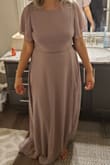 Dress is very pretty, and real long. The back opening was a bit off for me, I envisioned it different, but it might've been my height. Went with another dress instead. Fit like a regular dress would I don't think it runs small or large, I ordered a medium - Giovanna G.
