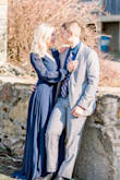 I wore this for our engagement photo session. It was absolutely stunning. I received so many compliments on it. The dress was a little long for me, I was able to camouflage it with positioning and heels. And the plunge was a little too deep for my preference so I popped a pin in there. Just two factors to consider! I absolutely loved it! - Kaitlin C.
