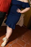 I first ordered a L, but it was very fitted and made my back fat a little more prominent so I reorder an XL and that one was perfect! It stayed on all night through my 21st birthday and it didn't budge! It was honestly awesome and looked sooooo nice - Rosmely P.