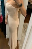 If you are possibly between sizes, size up because of the stretch in the fabric. It will pull on all the right places, and unfortunately, all the wrong ones too. Thankfully long enough. - Alexandra F.