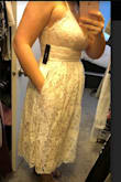 I bought this dress to wear to my wedding rehersal and it is literally perfect. It fits so well and you don't even need a bra. I actually love this dress so much that I just ordered it in black to wear to a wedding in a few months. - Kristen K.
