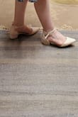Usually I'm a size 7, but based on other reviews, I sized down to a 6, and they were PERFECT. LOVE these, they were immediately comfortable to wear, and were perfect to pair with all the dresses I tried for a recent wedding. They could dress up and down super easily. Very versatile! One note: not great grip on the soles, so they can be quite slippery on certain flooring. - Olivia R.