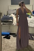 It's a great dress I really love the color and it fits really well. It is a little long and the sleeves are a little loose but overall wouldn't change anything. - Lindsey S.