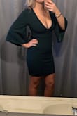 Wore this dress to a winter wedding and it was Absolutely perfect! I would originally pick a size medium but after reading reviews I went with a small and I'm glad I did! The material Is thick and stretchy, I just had a baby so it was perfect around my stomach. I wish I had taped up my breasts because I worried all night about losing them! But I can't blame the dress on my lack of preparation. The color is beautiful! - Casey L.