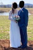 I ordered an XS based on reviews and body sizes. I did get a couple inches hemmed off the bottom. The arms with a little saggy, but I thought if I got them taken in it would mess up the back. I received so many compliments. I definitely recommend! - Kara K.