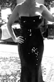 Everything you want a dress to be but can never seem to find. Looks and fits better than a $2000 dress of the same style that I rented last year. It fits snug, but not 'tight' and fits my (curvy) body perfectly, but it's also one of those dresses that you know will look good whether you are 5-10pbs lighter or heavier. I could easily still wear a small at 140 (and hey-sometimes that's me.) boobs aren't hanging out over the top, but it's tight enough that you still look super shapely. Length was perfect, I always wear 3-4" heels though. I did have to mind my train, as my heels wanted to get caught in the sequins if I wasn't careful that is my ONLY comment that isn't 1000% positive. (And I'm in my 40's classy-not trashy, but still very flattering) - Allison B.