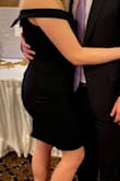 I purchased this dress for a wedding and it was even better than I expected. I received many compliments. The off the shoulder sleeves stayed put because they have a gripper material on them. The fabric is thick and stretchy. I usually only wear dresses once but I can't wait to wear this one again! - Kelly M.