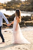 This dress fit perfectly and beautifully for my engagement photos. It was a little long but I am also 5 ft tall so any dress is long on me. - BRANDY H.