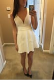 Runs a little large. I usually order medium size dresses but I took a chance on a small after reading other reviews. It is sooooo cute! A little short, but it's for my bachelorette so it works! - Kati S.