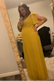 Dress is a perfect shade of mustard yellow for spring! I bought it for a photo shoot and I was 26 weeks pregnant so dress is flattering and forgiving in all the right places and at the same time accentuated my baby bump in a super cute way! I plan on wearing it for many different occasions, casual day with friends, I can dress it up for a night out or party and is breast feeding and post pregnancy friendly I can see myself growing on the belly and still being able to wear it. I wear it with flats so it's a little bit long, not too much but a small heel or wedge would be best for it!! I am currently 28 weeks and dress still looks good and is growing with me! - Ashley H.
