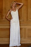 I had a 4 day wedding, with 3 parties, and chose this dress for the ceremony and party. Really nice and easy to wear. I was wearing flats. - Elsa A.