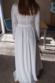 This dress fit me perfectly but was just slightly too long. I made it work by wearing high heels. It was extremely comfortable and everyone loved it! - Hanna E.
