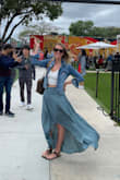 It fit me perfectly, and was very flattering. I wore it on a windy day and the fabric looked gorgeous flowing in the wind. I had compliments too! Only complaint- I found that the top of the skirt stretches out a little after wearing a while. Otherwise, I highly recommend it! - Natalie N.