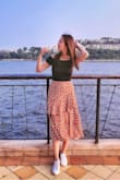 The material is super stretchy and comfy. can wear with or without a bra. The only reason I didn't give it 5 stars is that I'm worried the material might become overstretched and become loose. - Charmaine K.